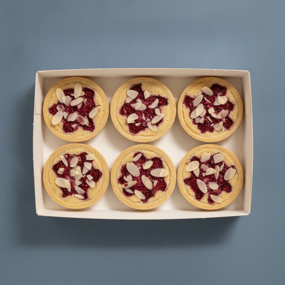 Almond Cream & Raspberry Mini Tarts — Box of 6 photo